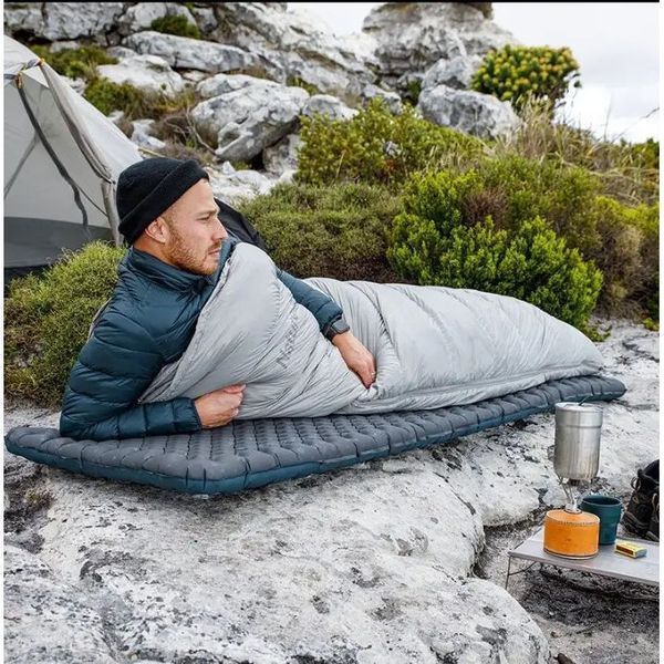 Матрас туристический надувной одноместный Naturehike CNH22DZ018, сверхлегкий, 183x64x7 см, черный, для туризма с мешком для надува. 6975641888567 фото